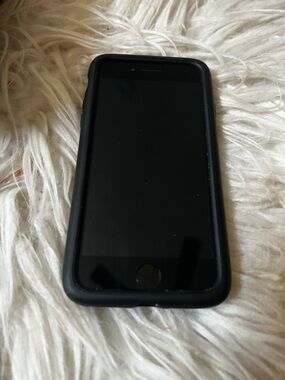 Apple iPhone with Black Protective Case for parts only